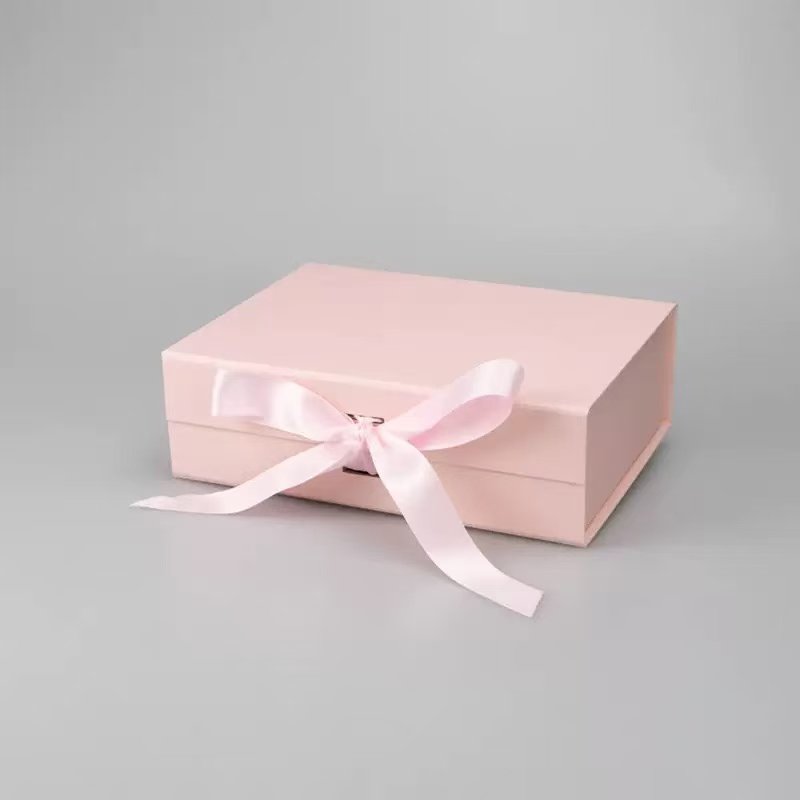 Caja rosa con forma de libro