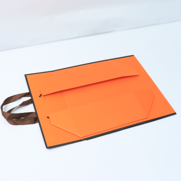 Luxury Foldable Magnetic Apparel Box with Ribbon Handle Luxury Foldable Magnetic Apparel Box with Ribbon Handle
