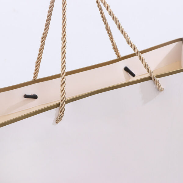 Wholesale White Paper Shopping Bag with Gold Rope Handles